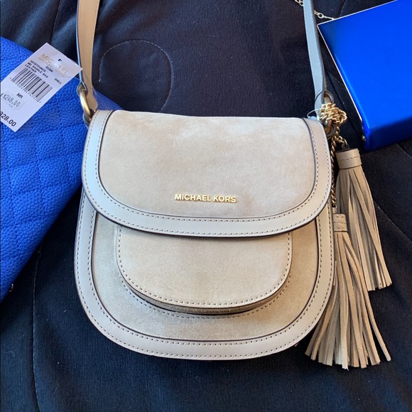 Michael Kors Handbags - Micheal Kors Brand NWT Saddle Bag